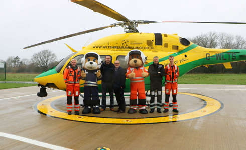 Mascot sponsor Soft Options photographed alongside two paramedics, a pilot and our two charity bear mascots Wilber and Marsha.