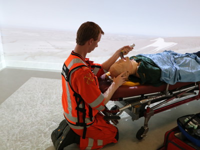 Critical care paramedic Craig Wilkins in a training scenario in the charity's simulation room using a mannequin and medical equipment. Critical care paramedic Craig Wilkins in a training scenario in the charity's simulation room using a mannequin and medical equipment.