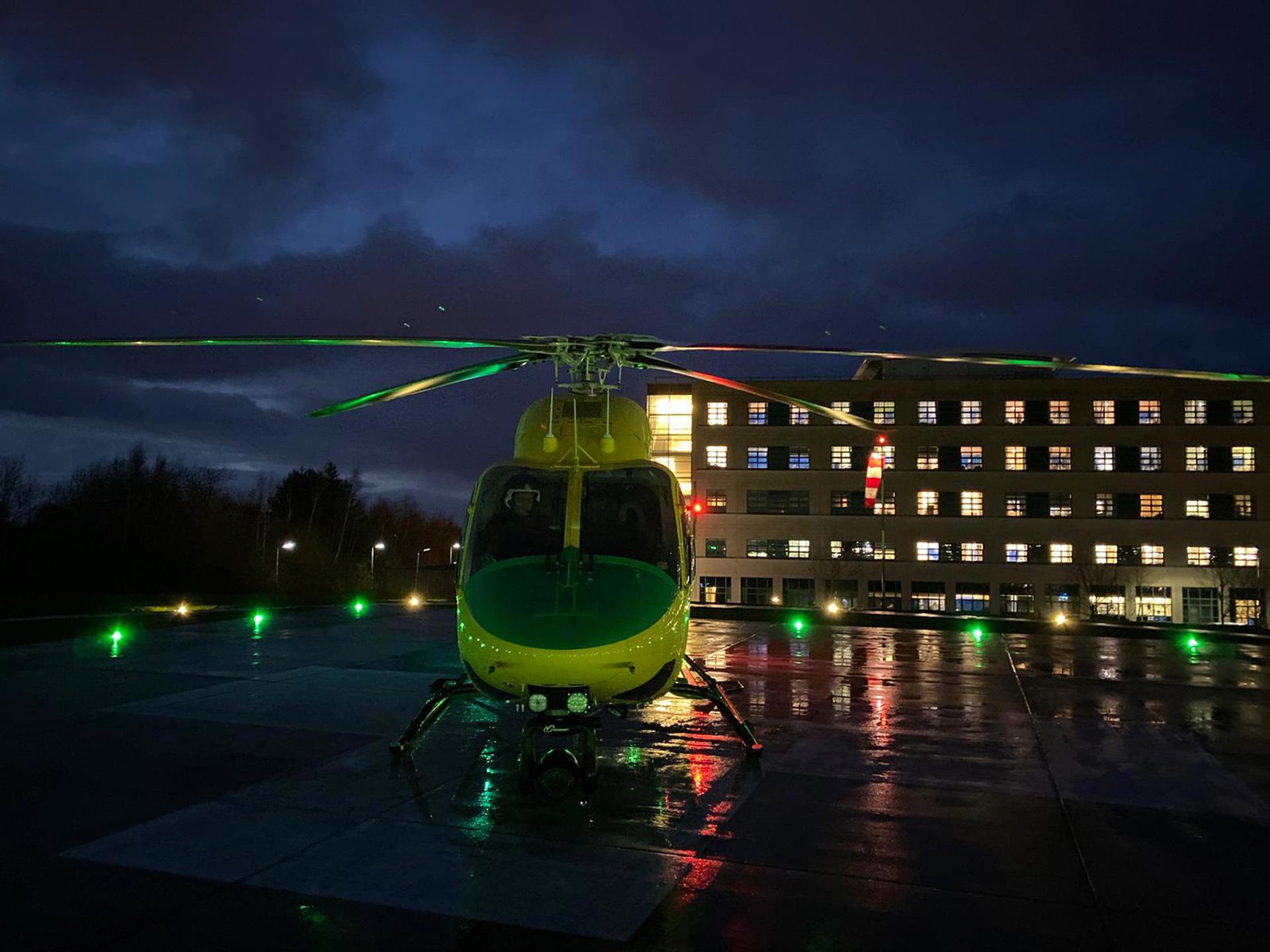 Wiltshire Air Ambulance's helicopter landed at Great Western Hospital, Swindon at night Wiltshire Air Ambulance's helicopter landed at Great Western Hospital, Swindon at night