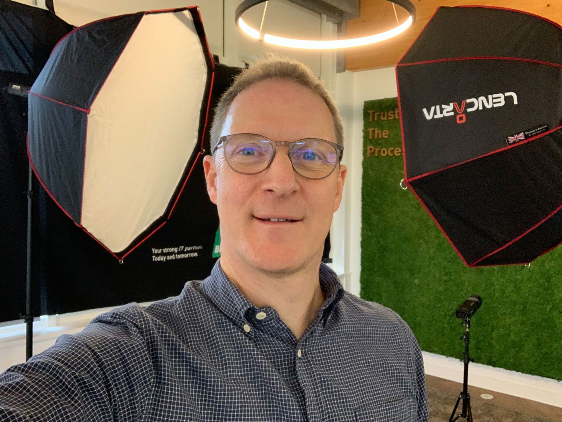 A headshot image of Nick Cole at a photography studio