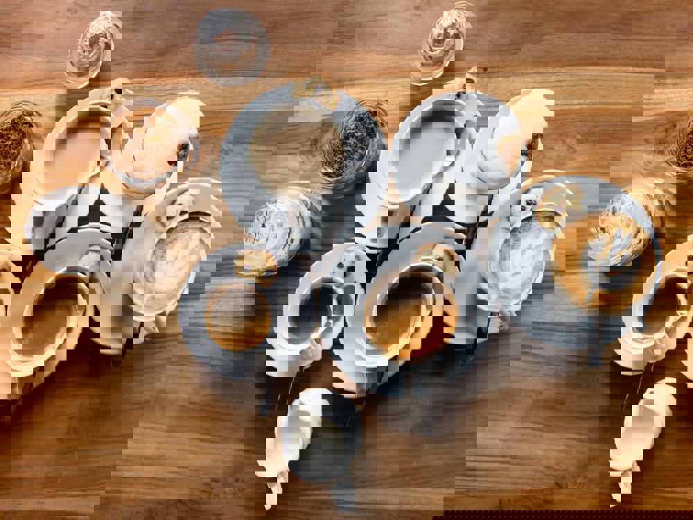 Various coffees on a wooden table