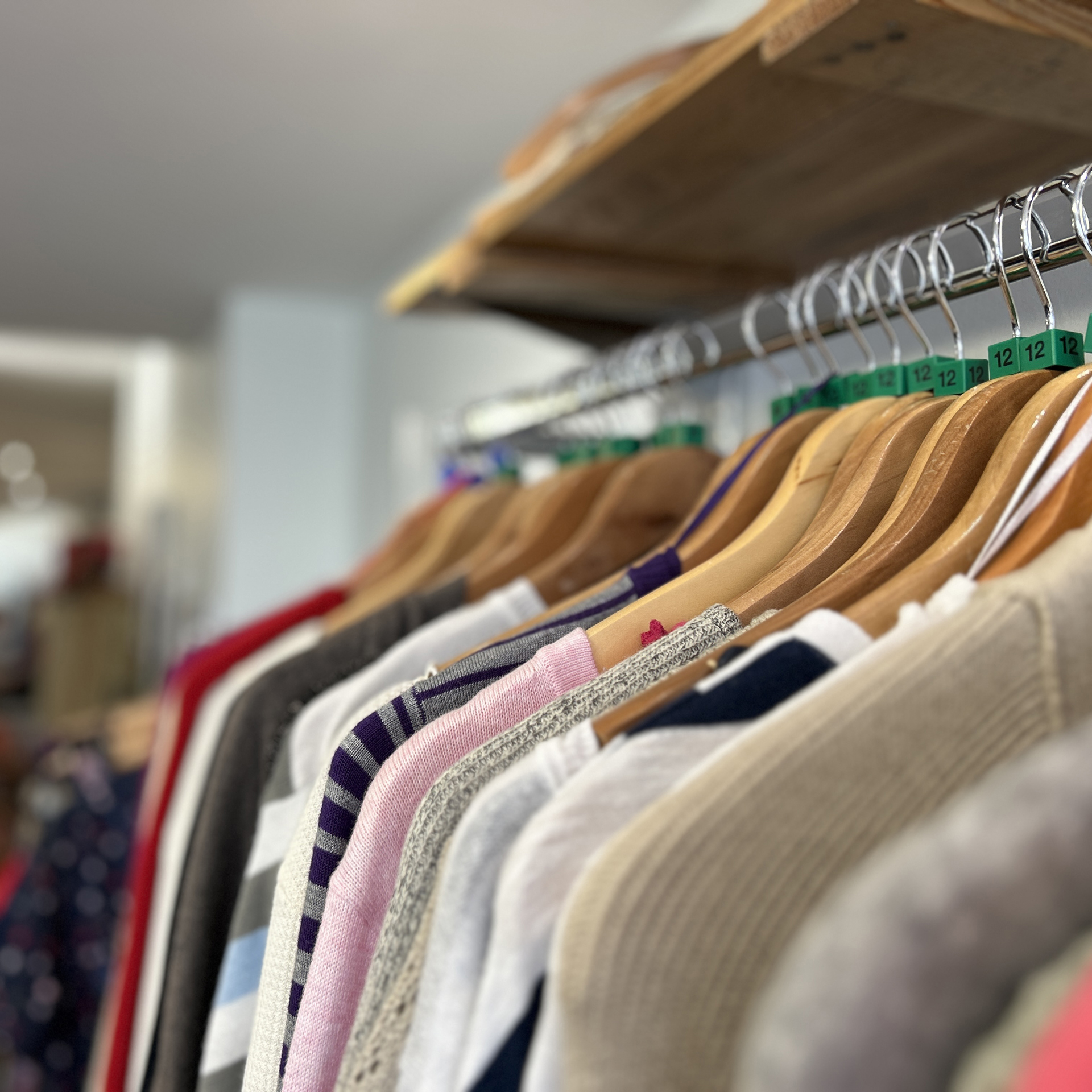 A rail of clothing for sale in the Devizes Charity Shop A rail of clothing for sale in the Devizes Charity Shop